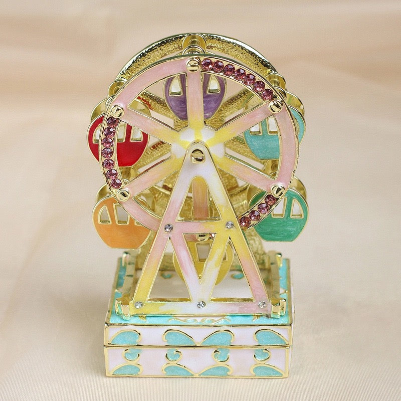 Enameled jewelry box with rotating Ferris wheel ornament, diamond-encrusted handicraft gift.