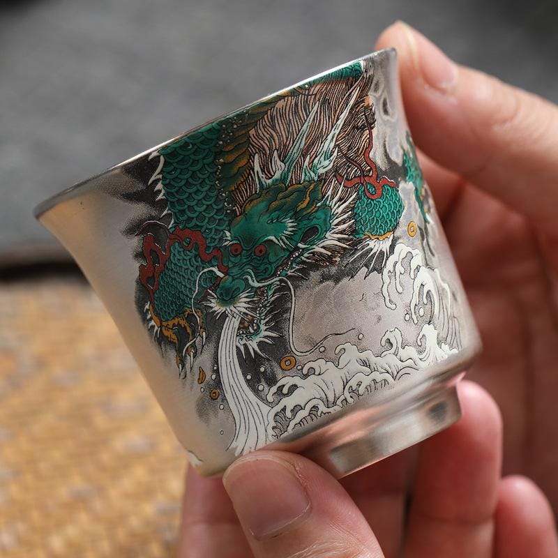 Solid sterling silver inside and out  Dragon Silver-Plated Tea Cup