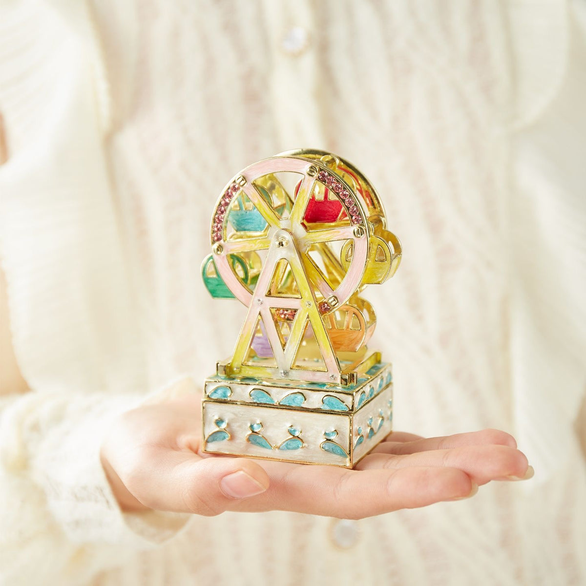 Enameled jewelry box with rotating Ferris wheel ornament, diamond-encrusted handicraft gift.