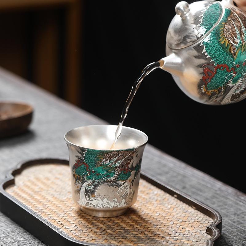 Solid sterling silver inside and out  Dragon Silver-Plated Tea Cup
