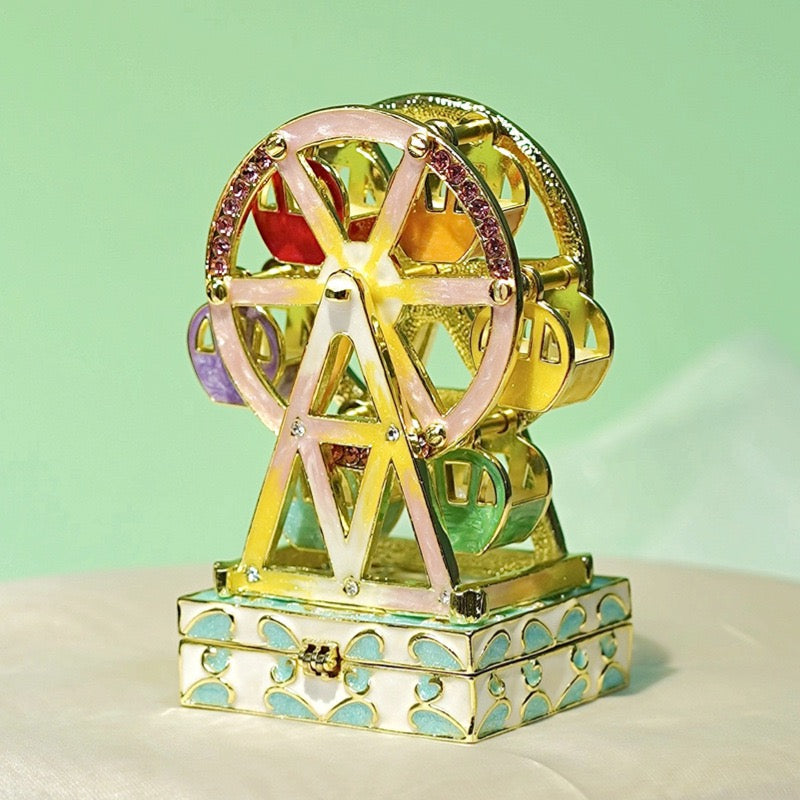 Enameled jewelry box with rotating Ferris wheel ornament, diamond-encrusted handicraft gift.