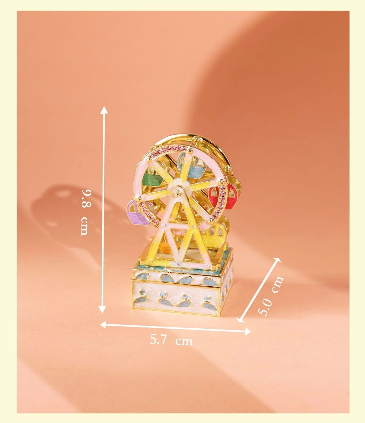 Enameled jewelry box with rotating Ferris wheel ornament, diamond-encrusted handicraft gift.