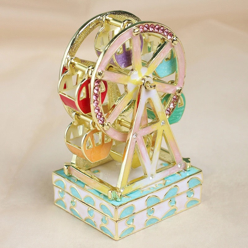 Enameled jewelry box with rotating Ferris wheel ornament, diamond-encrusted handicraft gift.